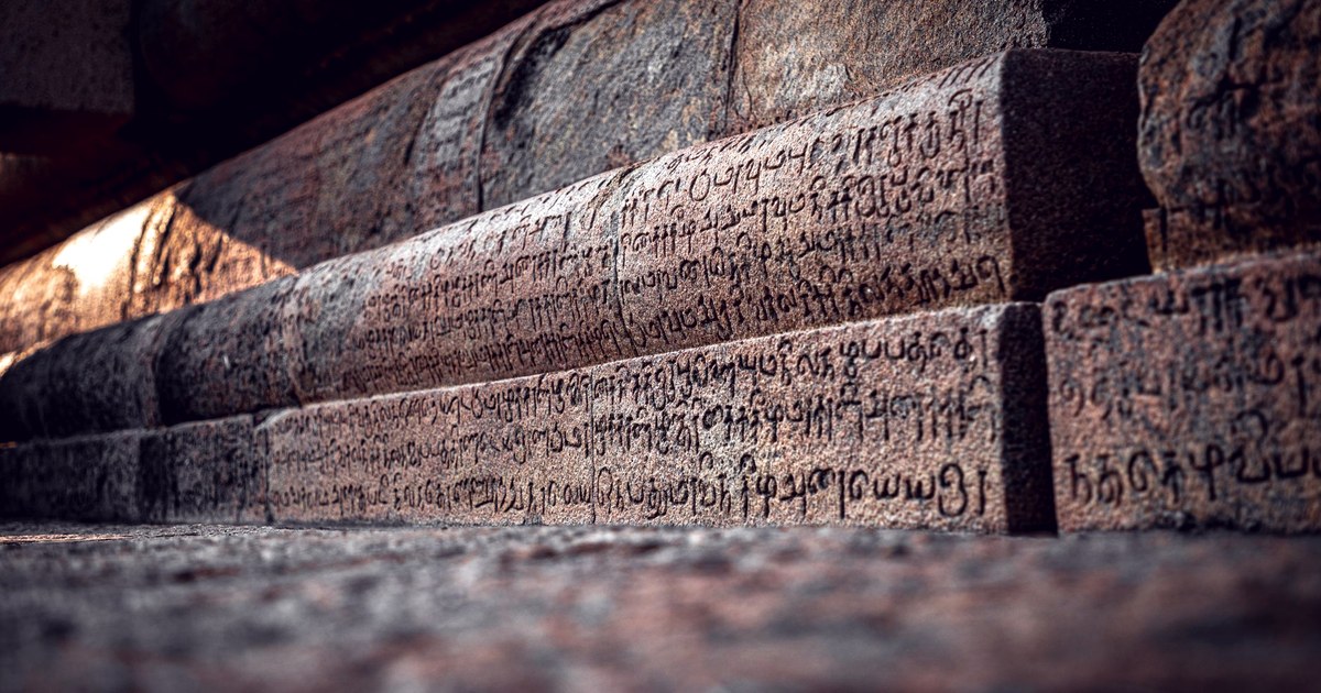Close-up of ancient stone inscriptions carved into temple steps, the kind of heritage record the Bengaluru project is digitizing before it is lost