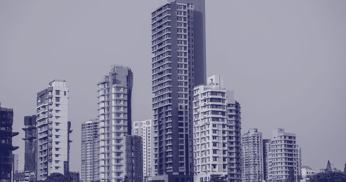 Residential and office skyscrapers in Mumbai against a clear sky