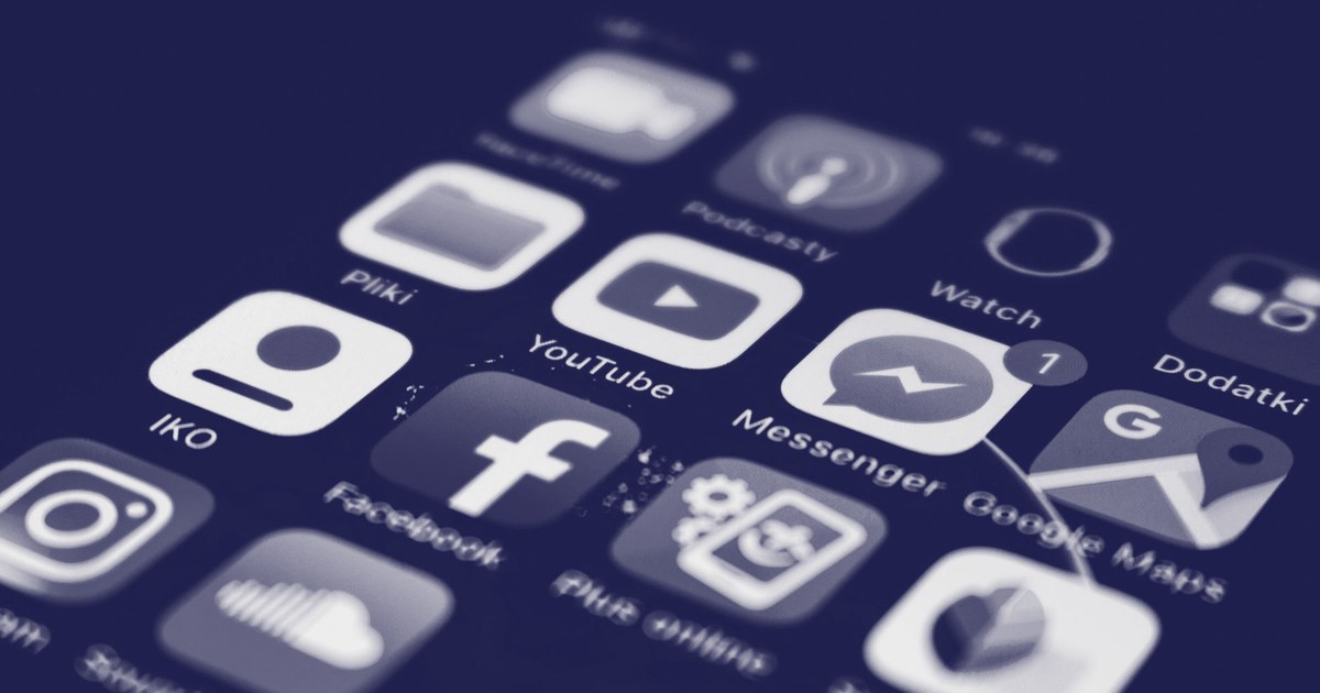 Close-up of a smartphone home screen showing the Facebook, Messenger, Instagram and YouTube app icons
